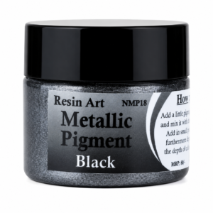 Black metallic pigment paste in a small jar with a black lid.